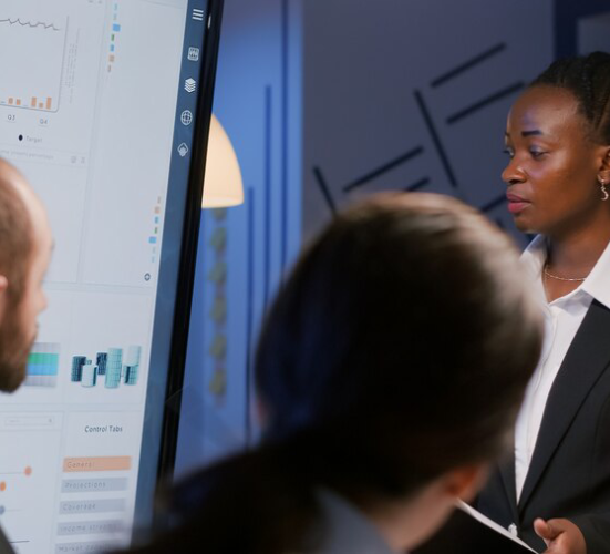 a amle in a office explaining about commodies